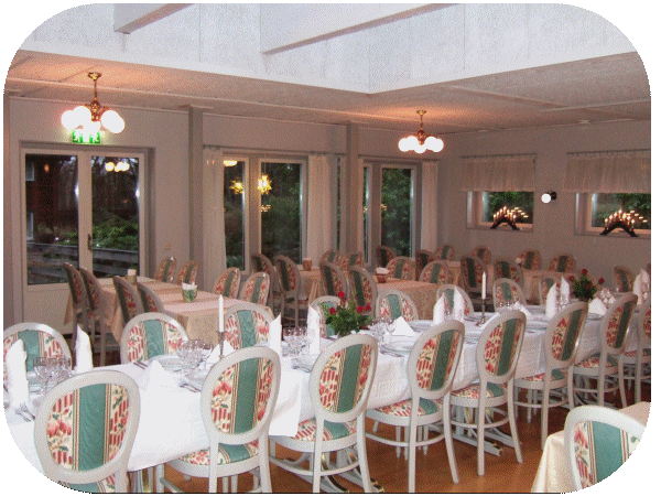 The large dining room set for festive feast.